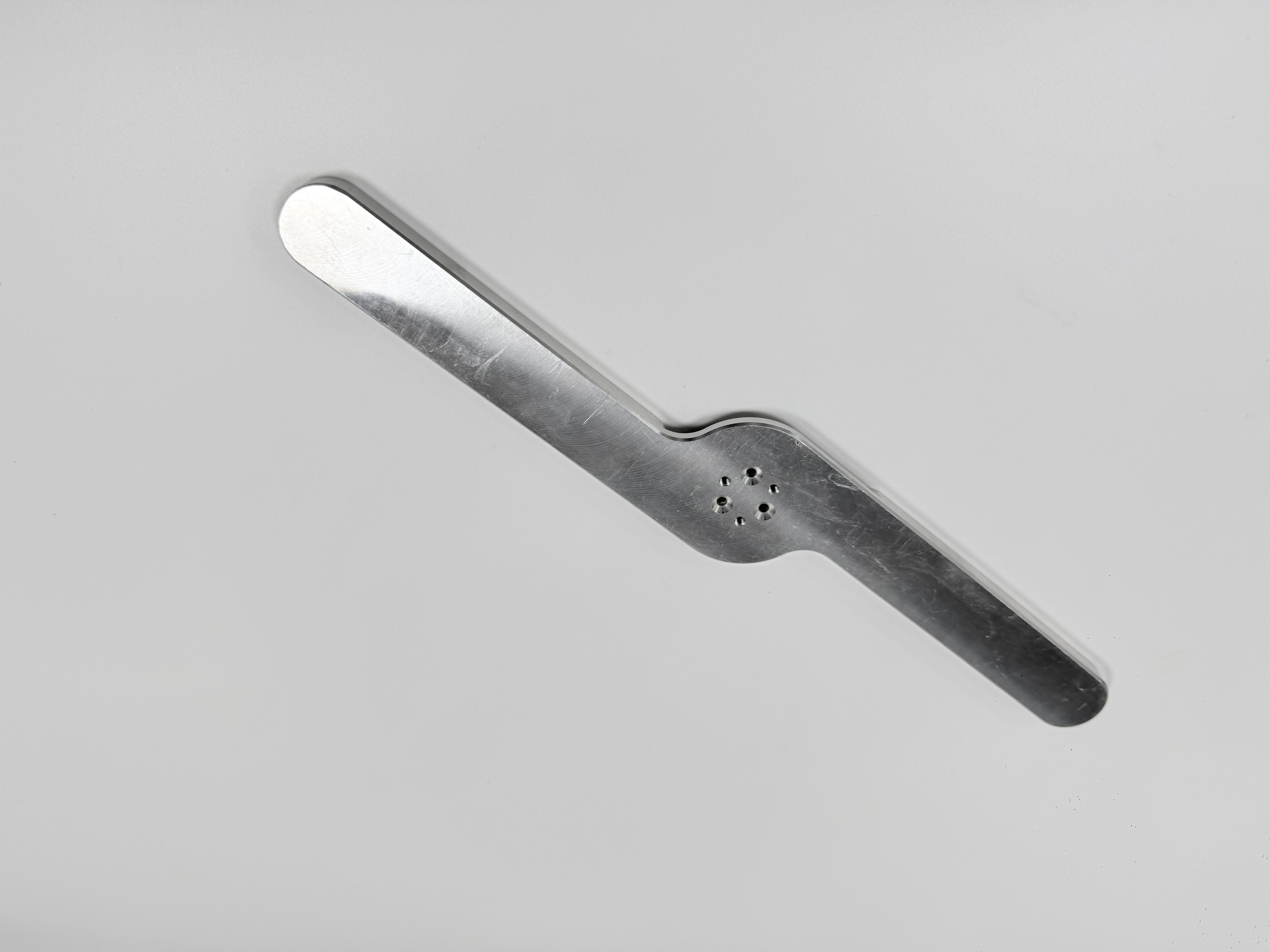 The same matte-finish link arm shown from another angle